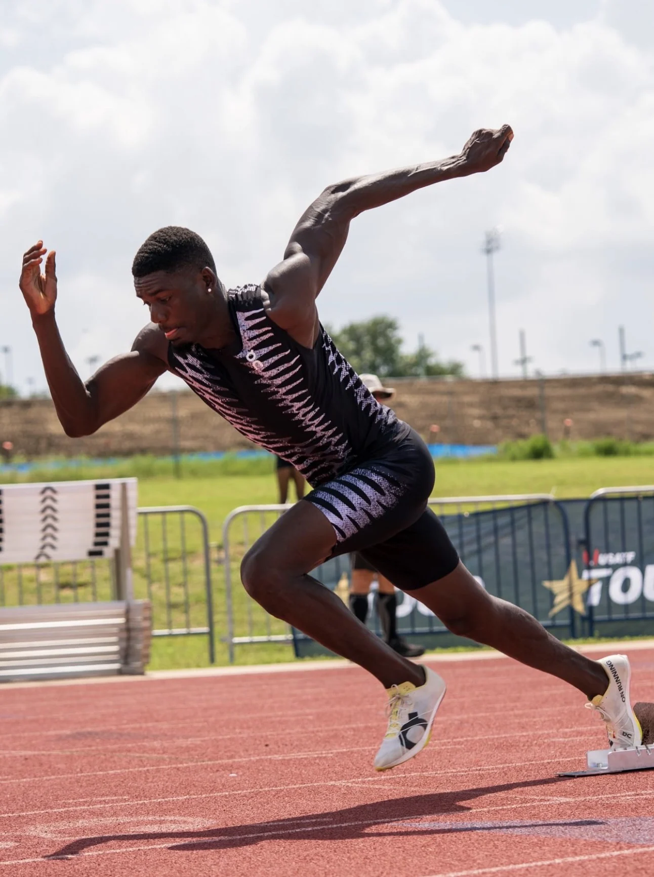 Sprinter accelerating from the starting blocks at ATX Classic